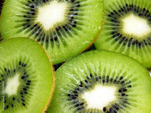 A macro shot of freshly sliced kiwi fruit