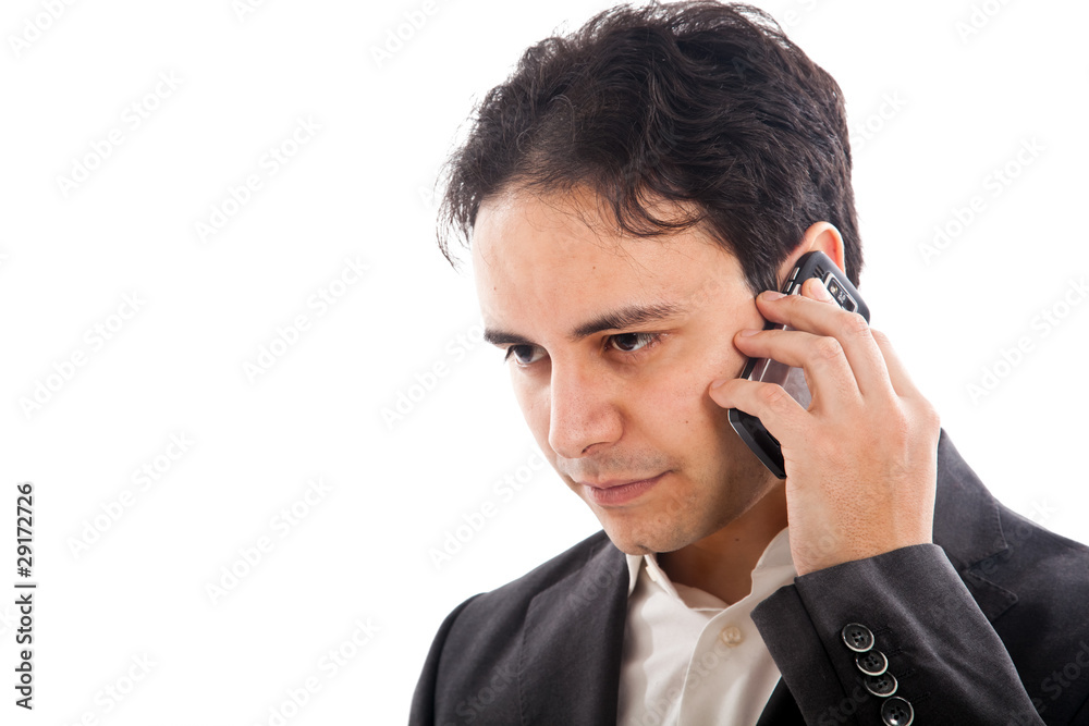 Businessman talking at the phone isolated on white Businessman talking at the phone isolated on white