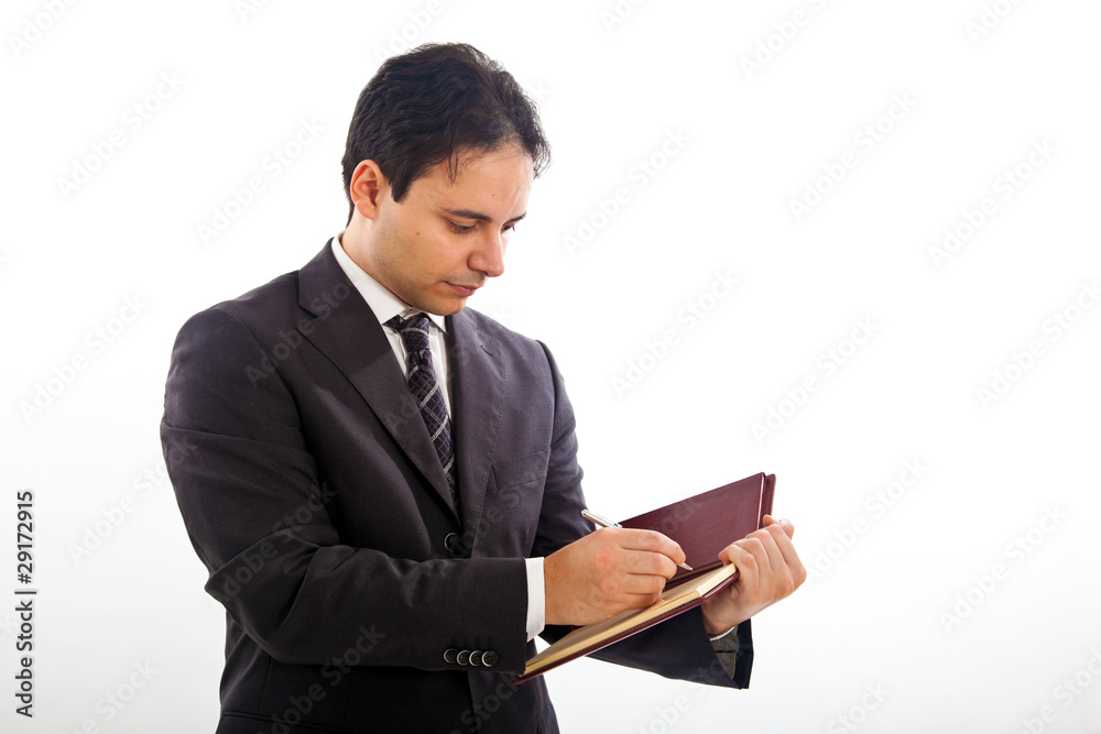 Businessman in black suit holding documents on white background Businessman in black suit holding documents on white background