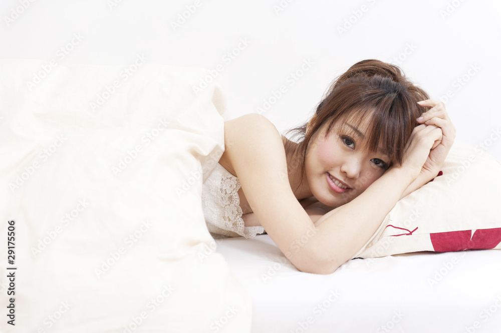 a portrait of beautiful asian woman on the bed a portrait of beautiful asian woman on the bed