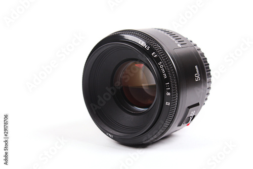 Black camera lens isolated in white background