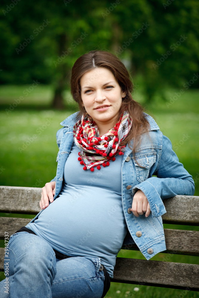 Beautiful pregnant woman in the park Beautiful pregnant woman in the park