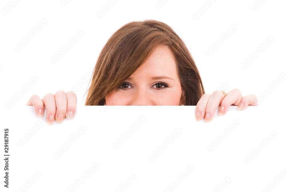 Picture of beautiful brunet woman holding a blank billboard Picture of beautiful brunet woman holding a blank billboard