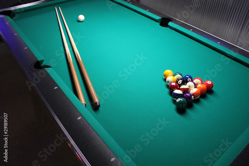 Pool Table - A Pool Table, set up for a game. photo
