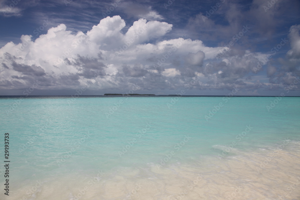 An island landscape in Maldives with cloudy sky