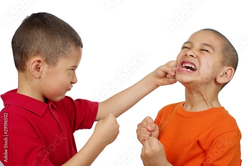 Tablou pe pânză Kids fighting, seven and eight years old