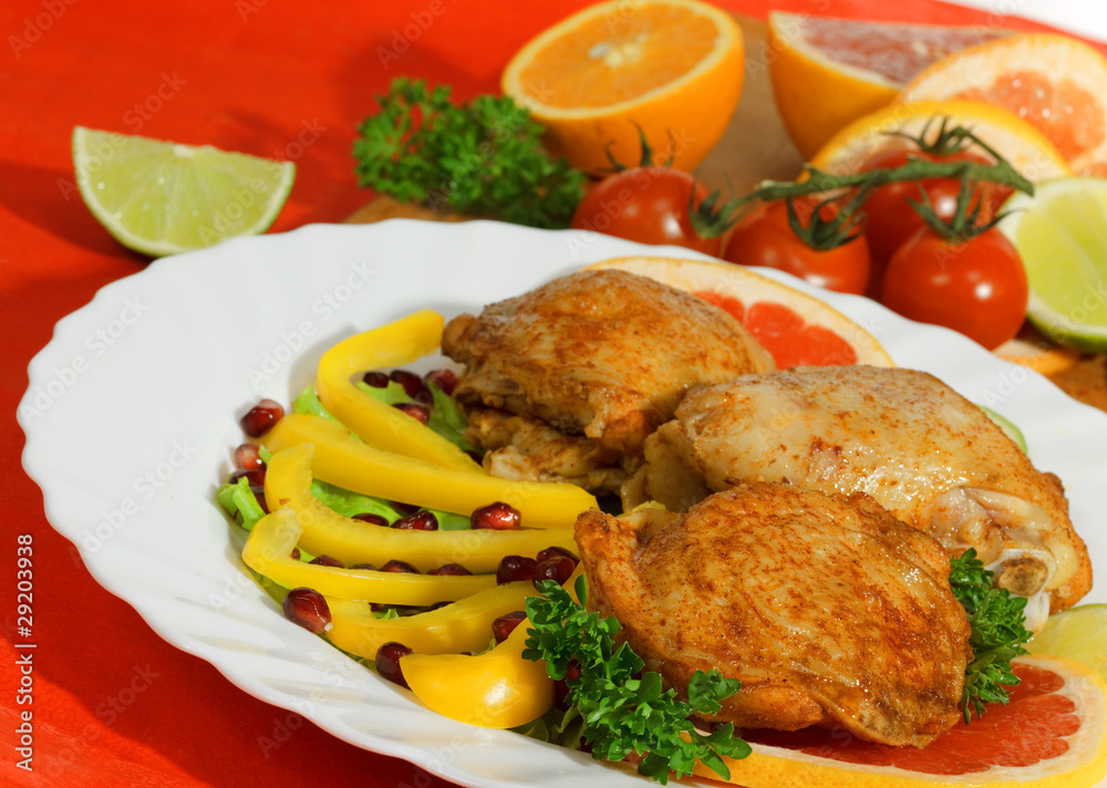 Fried chicken leg with lemon and cucumber Fried chicken leg with lemon and cucumber