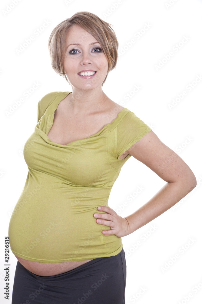 Pregnant pretty woman in studio over white background Pregnant pretty woman in studio over white background