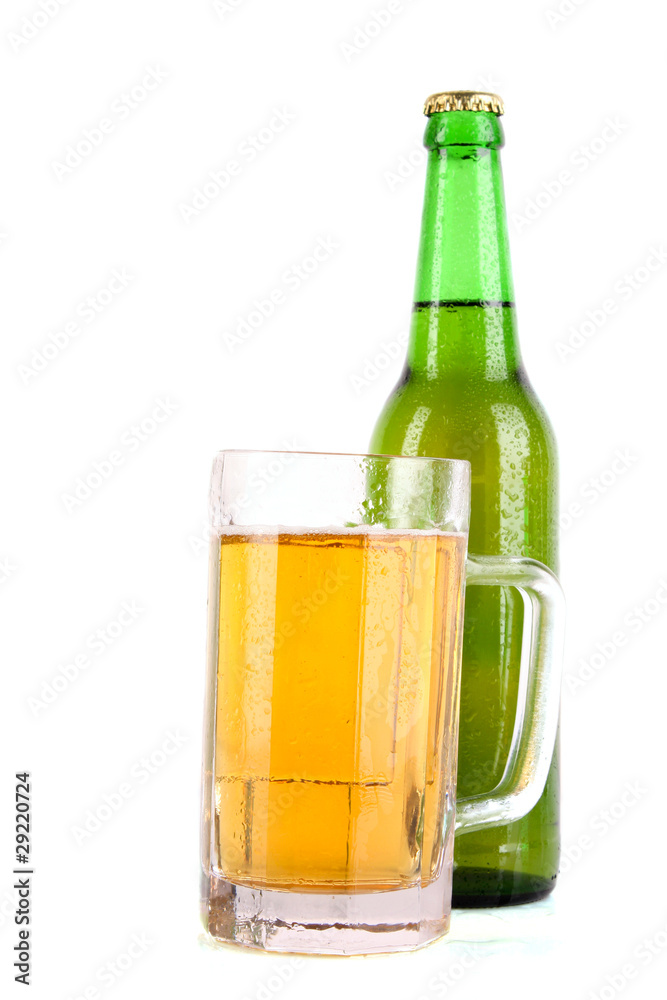 Bottle of beer and cup isolated on white Bottle of beer and cup isolated on white