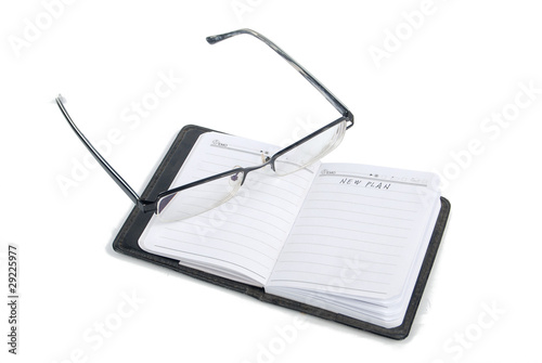 Notepad and glasses