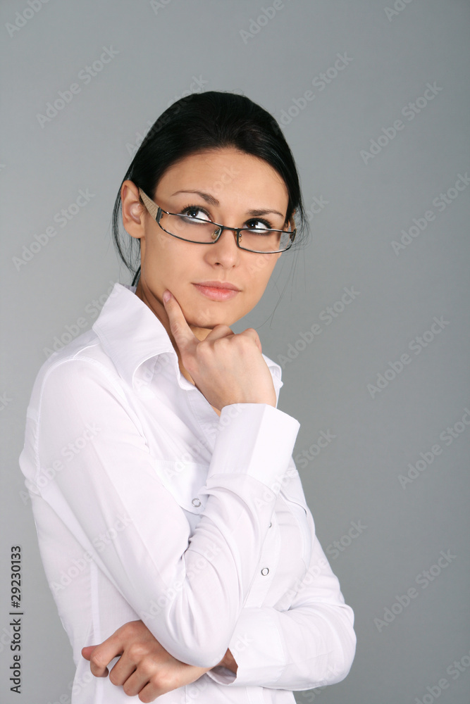 Young beautiful businesswoman thinking Young beautiful businesswoman thinking