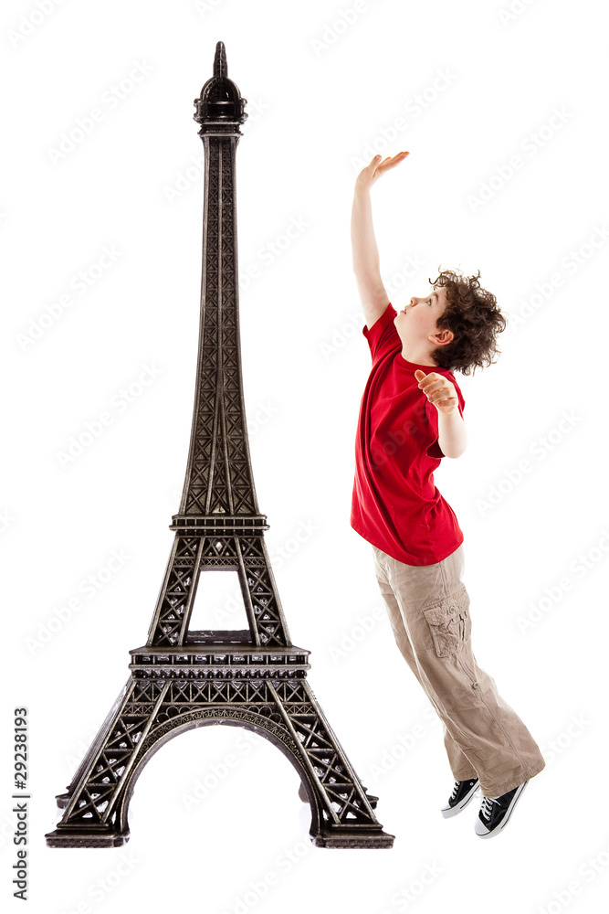 Eiffel tower and boy jumping isolated  on white