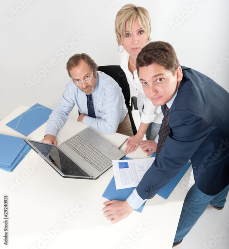 Three people at work