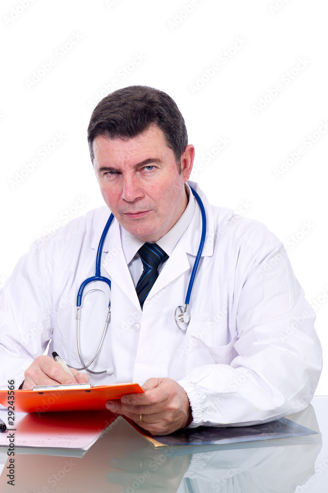 mature doctor writing mature doctor writing