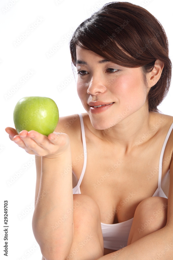 Beautiful Japanese girl holding green apple fruit Beautiful Japanese girl holding green apple fruit