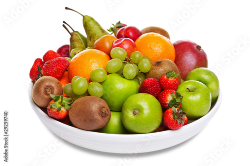 Bowl of fresh fruit isolated on white