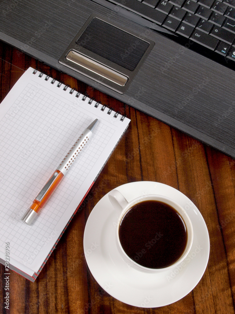 Laptop and cup Laptop and cup