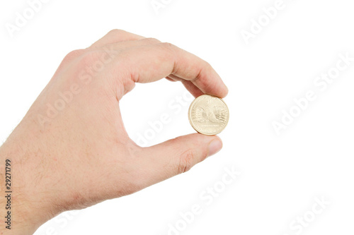 Holding Gold Coin Between Fingers