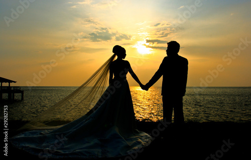 Wedding couple sillhouette at sunset