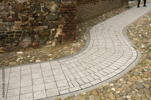 modern pathway in ancient surroundings