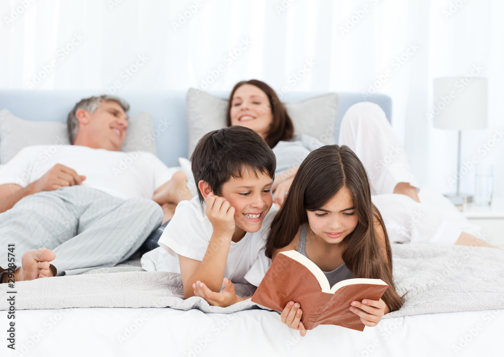 Parents talking while their childrens are reading