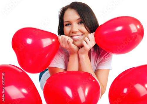 Cute young girl with a red hearts