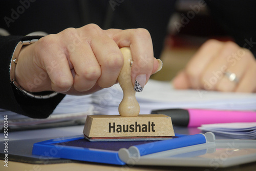 Stempel mit Hand und Haushalt photo