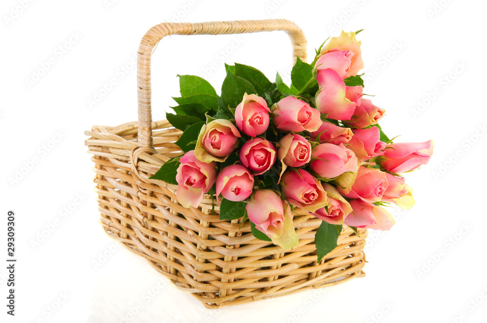 Bouquet pink roses in cane basket