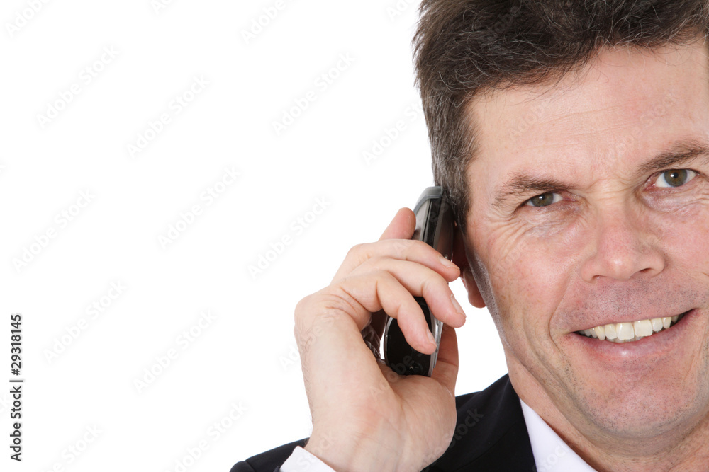 Attraktiver Geschäftsmann führt ein Telefonat. Attraktiver Geschäftsmann führt ein Telefonat.