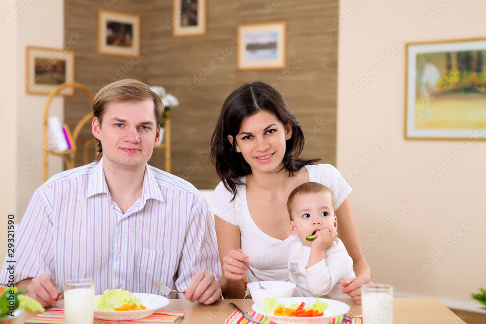 young family at home having meal