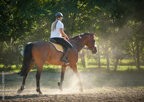 girl riding a horse © Dusan Kostic