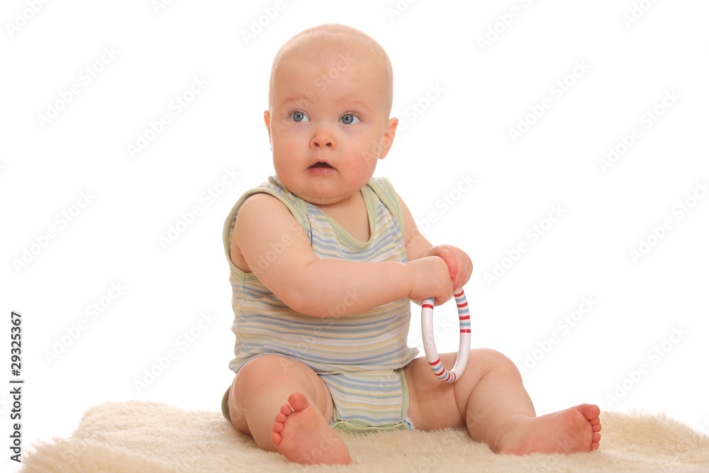 Porträt eines niedlichen Baby auf dem Boden sitztend Porträt eines niedlichen Baby auf dem Boden sitztend