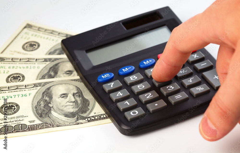 Calculator and money - accounting concept Calculator and money - accounting concept