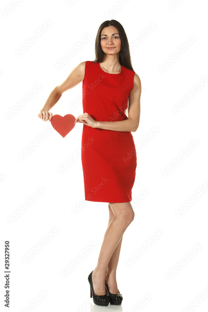 Female in reddress holding heart shape isolated on white Female in reddress holding heart shape isolated on white