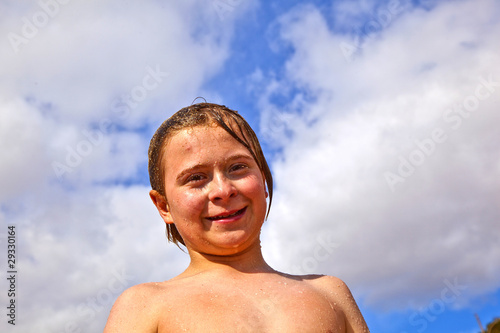 boy has fun at the beach