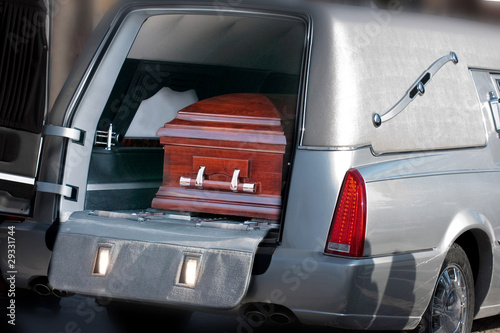 Coffin in a hearse photo