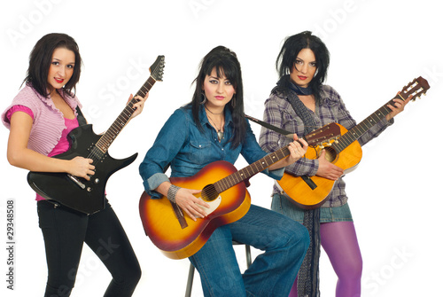 Band of attractive women with guitars