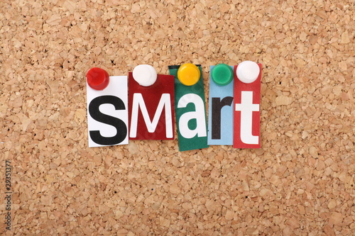 The word Smart in magazine letters on a notice board