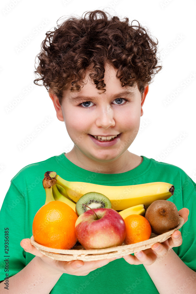 Boy holding fruits isolated on white background Boy holding fruits isolated on white background