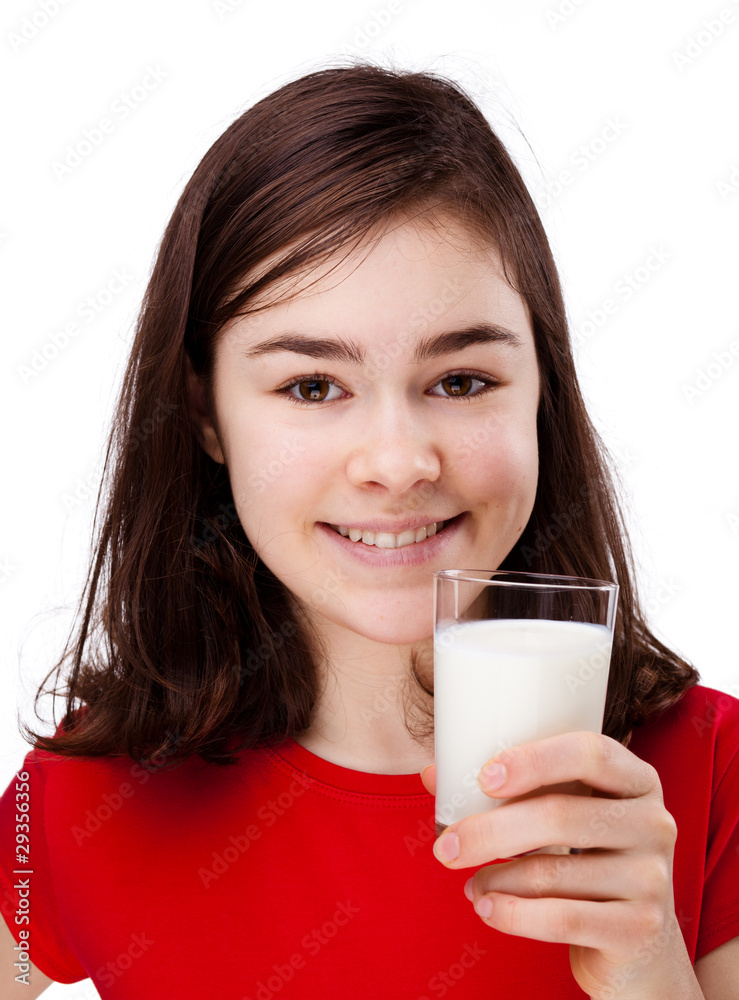 Girl holding glass of milk isolated on white background Girl holding glass of milk isolated on white background