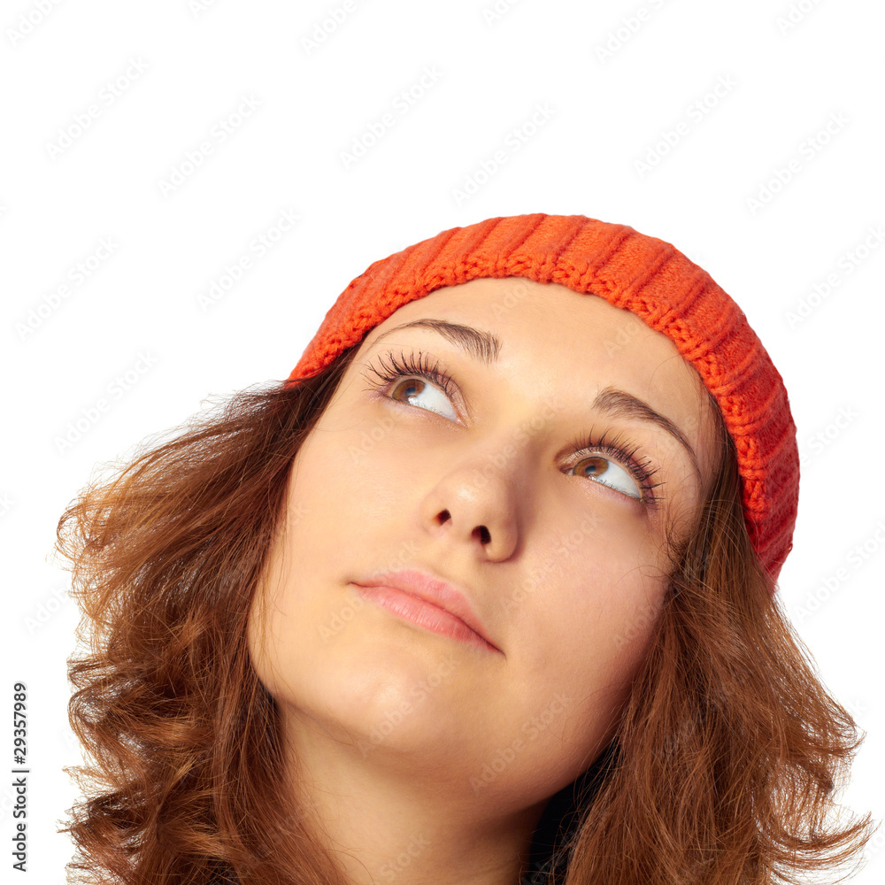 Young girl looking up. Isolated on white