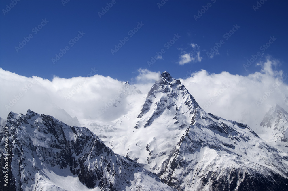 High mountains in cloud