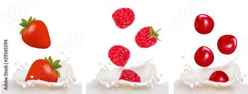 raspberry, strawberry and cherry fruits falling into the milk