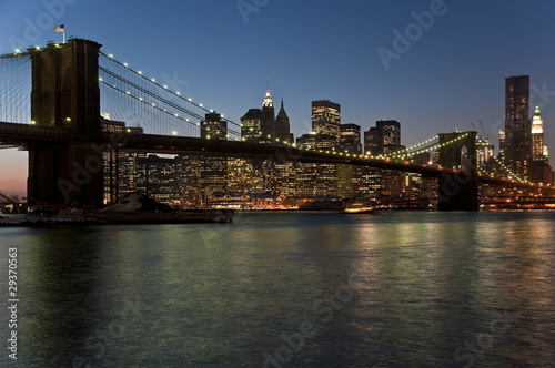 Brooklyn Bridge and Manhattan skyline at dusk  New York City 