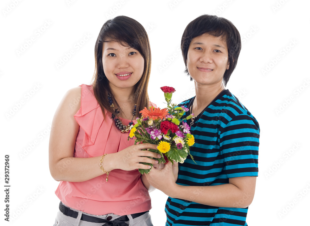 two asian women with flowers two asian women with flowers