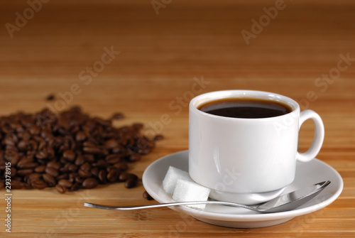 Coffee cup and roasted beans