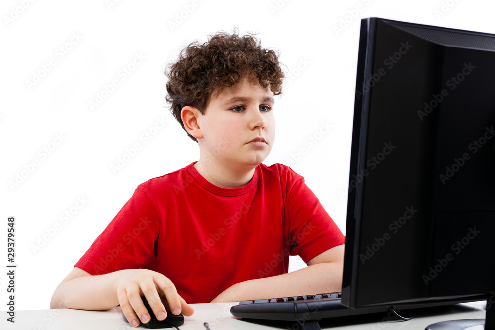 Boy using computer isolated on white background