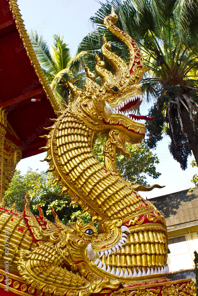Fototapeta premium Naga or Nak statue infront of Buddhist church