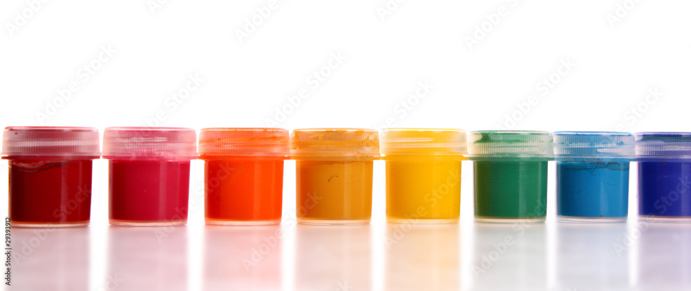 Raw of gouache cans and brushes isolated on white Raw of gouache cans and brushes isolated on white