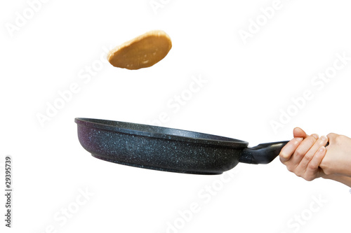 Flipping a pancake.